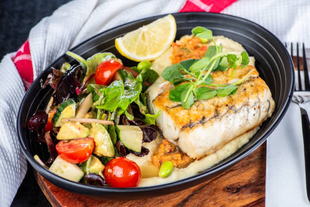 istock A serving of grilled Barramundi 2160021643