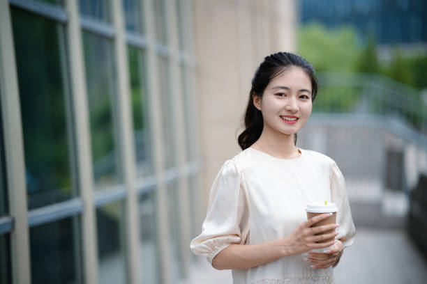 istock Adult female university student on university campus 2160022168