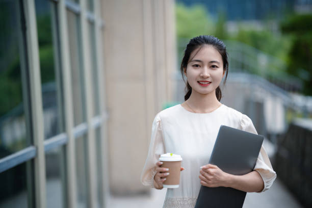 istock Adult female university student on university campus 2160022204