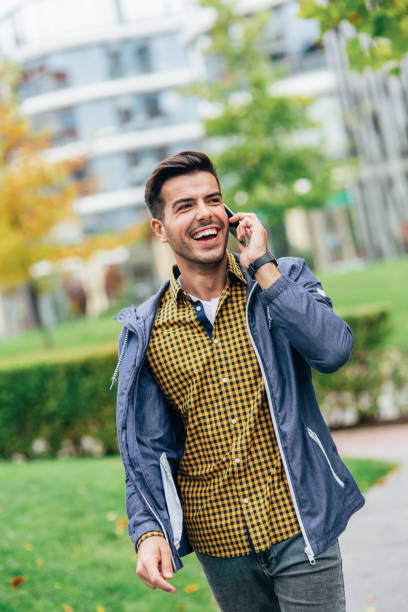 istock Young man talking to the phone 2160032045