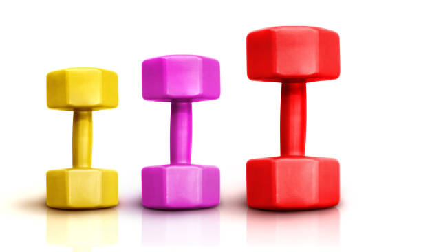 istock Red, pink, yellow steel dumbbells for exercise on a white background. 2160032833