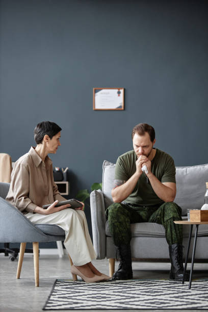 istock Soldier on Couch in Therapists Office 2160033654