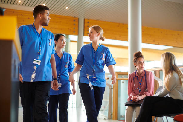 istock nursing students in hospital corridor 2160034782