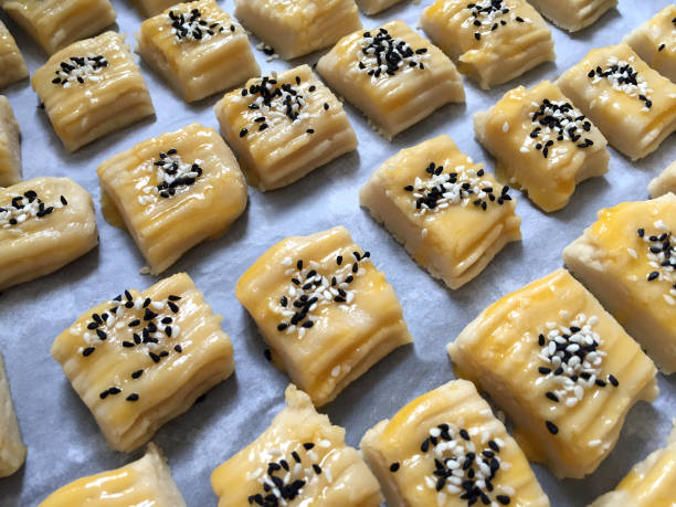 Close-up of homemade salty cookies, pastry, biscuits in baking sheet