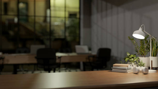 istock A copy space for displaying products on a wooden table in a modern office at night. 2160038235