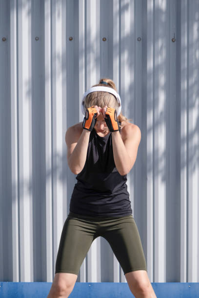 istock young female boxer training in the stadium 2160038803