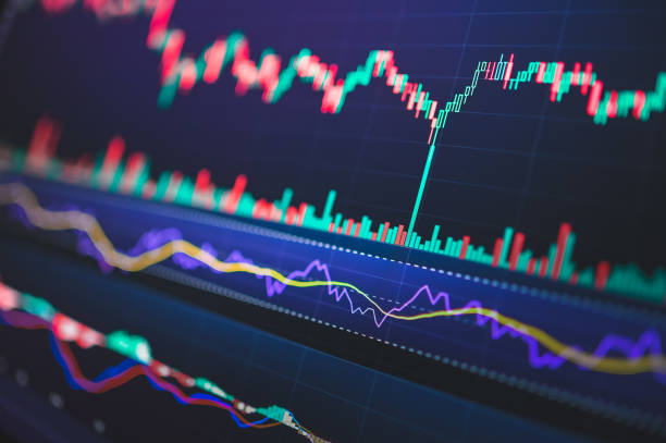istock A financial analyst using AI-powered predictive analytics to forecast market trends and investment opportunities. 2160041298