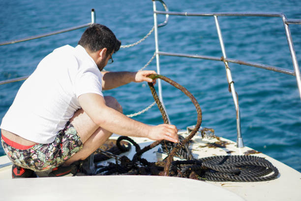 istock Young Man in action of pulling rope stock 2160042698