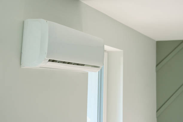 istock Air conditioner maintenance. Male technician repairing cooling system 2160042837
