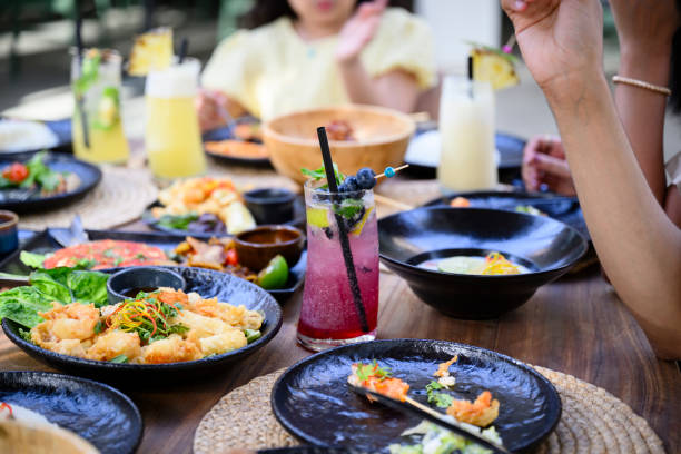 Appetizers and fruit drinks covering outdoor resort table