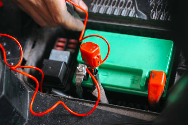 istock battery terminals on the motorbike, in open state 2160046396