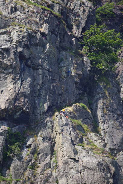 istock Climbers on the face of Raven Cragg. 2160048313