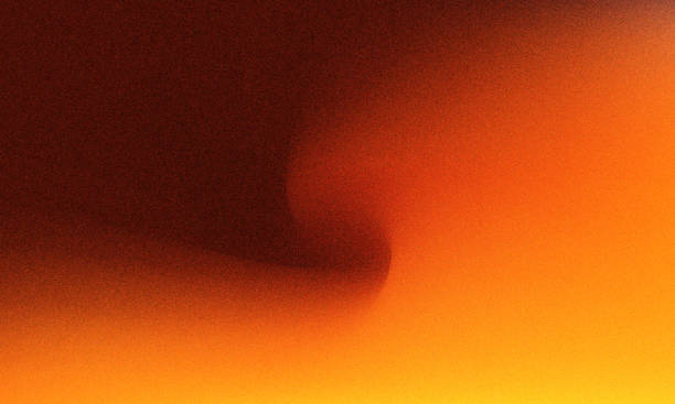 istock Golden Orange Gradient Grainy background. Red and orange wave color abstraction with vintage grainy texture. 2160049654