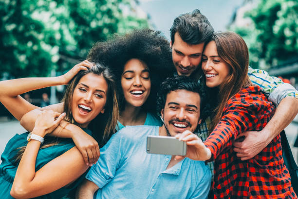 istock Young people taking selfie at the street 2160053536