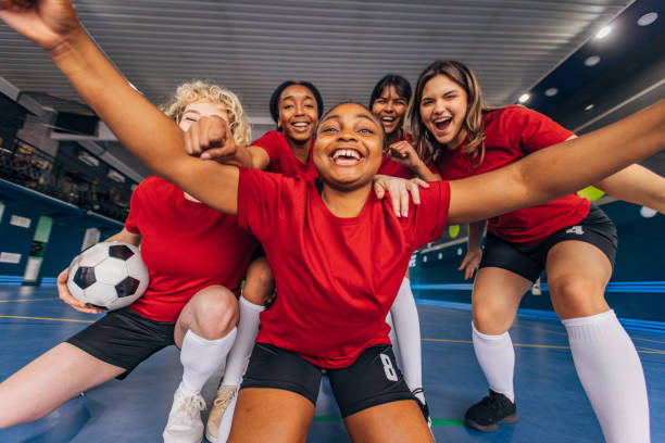 istock Excited teammates celebrating indoors with joy and unity. 2160054286