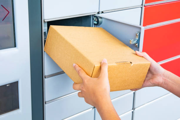 istock Parcel delivery photo, post automat machine and pickup point 2160059934