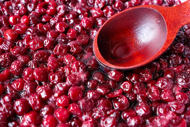 istock Homemade cherry jam. Recipe. Wooden spoon. 2160062701