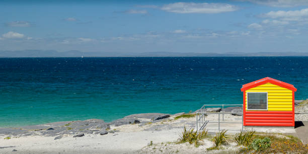 istock Brightly coloured kiosk by the sea, Aran Isles 2160063331