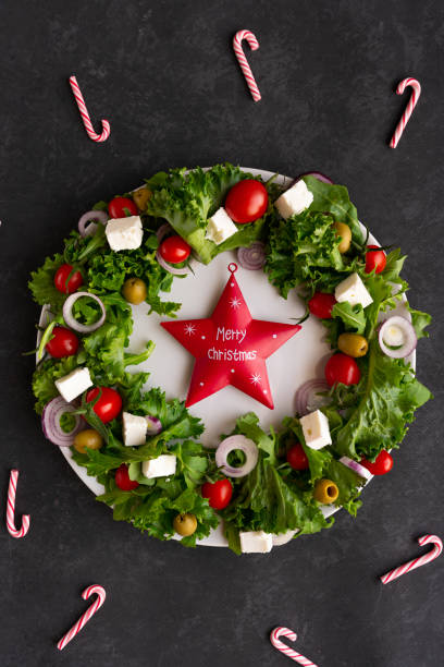 istock Christmas wreath salad on dark background 2160063596
