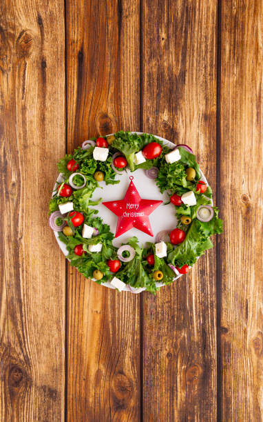 istock Christmas wreath salad on dark background 2160063803