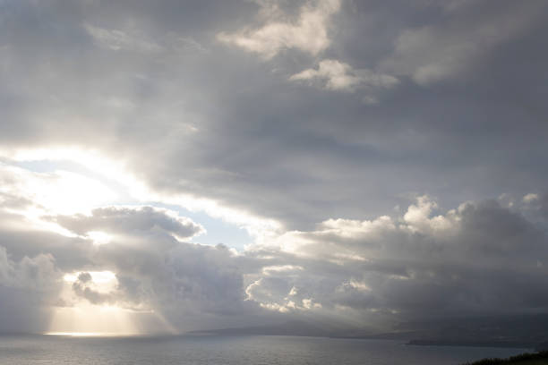 istock The sky is cloudy and the sun is shining through the clouds 2160064968