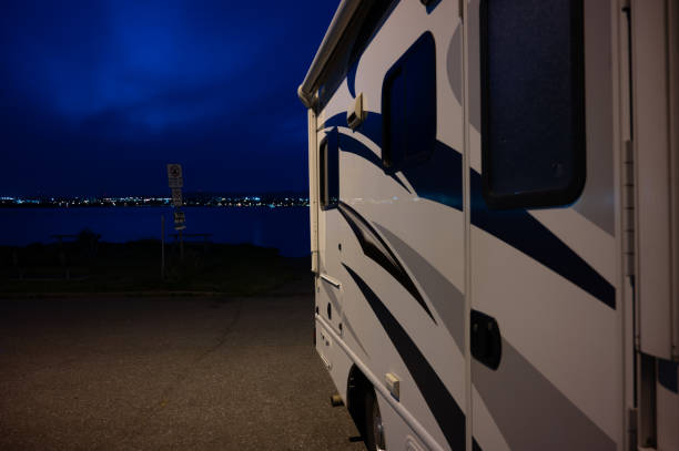 istock Side view of motor home at night 2160065729