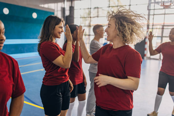 istock Teammates enjoying a high-five moment during practice session. 2160067993