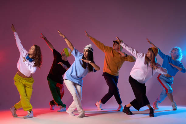 istock Group of energetic dancers on stage 2160068258