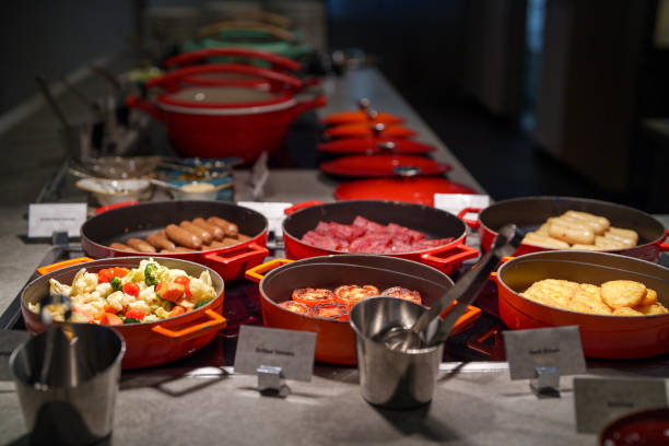 istock Prepared food in warming dishes on a buffet line 2160072071