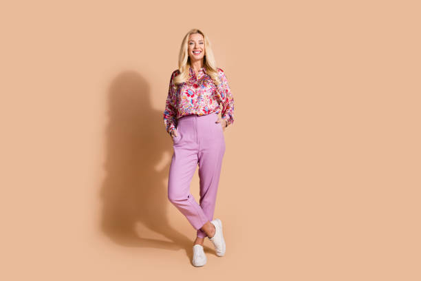 istock Full size photo of gorgeous lady posing empty space wear shirt isolated on beige color background 2160073473