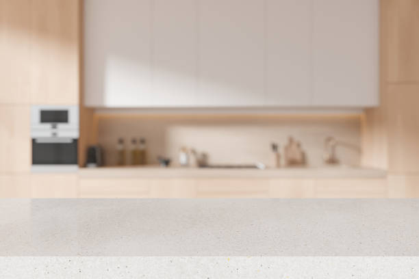 istock Stone countertop on background of kitchen interior cooking space. Mockup 2160079097