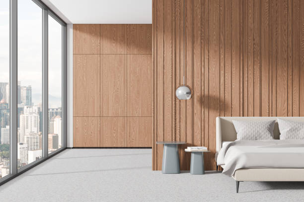 istock Wooden minimalist home bedroom interior with bed and decor, panoramic window 2160081769