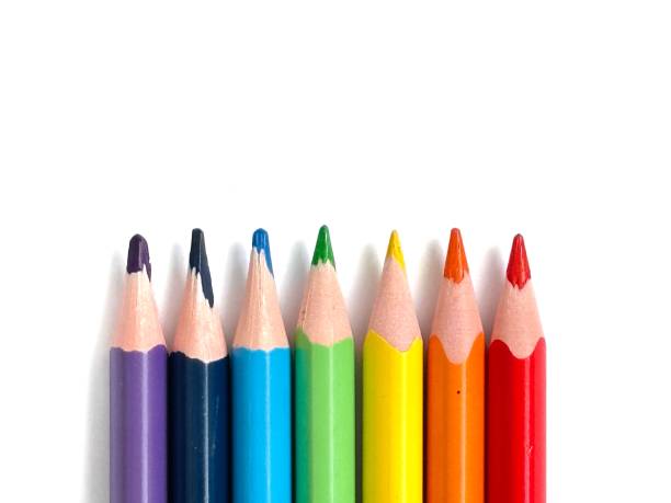Rainbow Colored Pencils in Row Isolated on White Background.