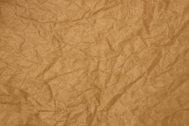 istock brown paper craft crumpled texture background 2160083193