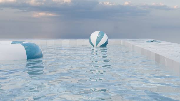 istock 3d render of floating beach ball and clouds approaching swimming pool 2160083812