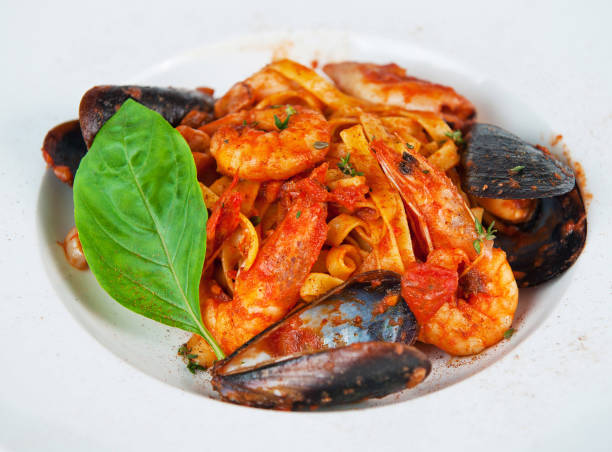 istock Seafood pasta delight on white plate 2160085232