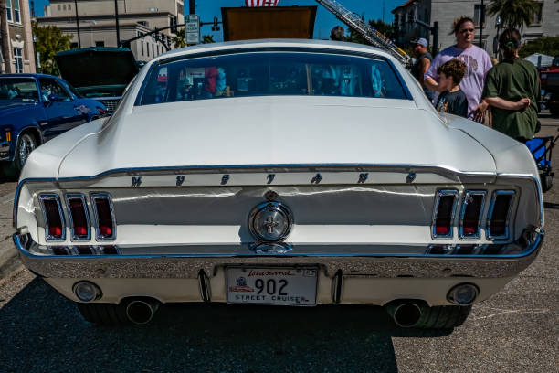 Gulfport, MS - October 01, 2023: High perspective rear view of a 1967 Ford Mustang Fastback Coupe at a local car show.