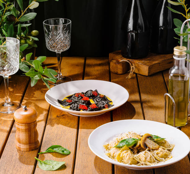 istock Gourmet italian pasta dishes on rustic wooden table 2160085693