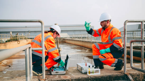 istock Employees check water quality in wastewater treatment plants. 2160086754