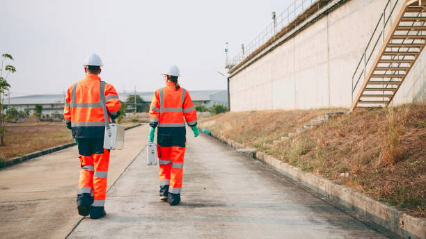 istock Inspectors are analyzing a water sample at the sewage cleaning site. 2160086763