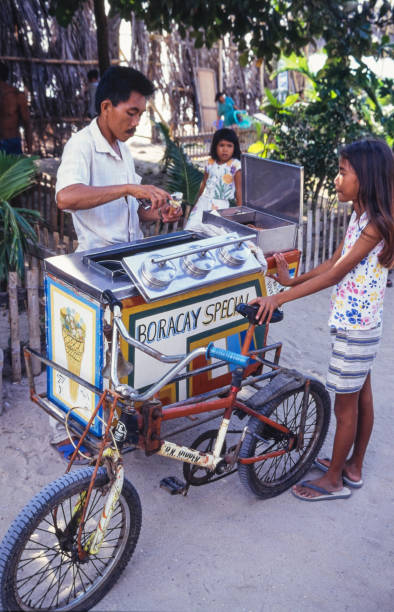 Boracay, Philippines - June 24, 2024: Ice cream seller on the streets of the island