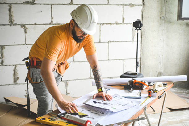 istock worker doing renovations in an apartment 2160087221