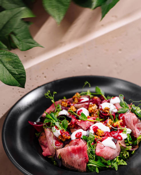 istock Fresh gourmet steak salad on elegant plate 2160087222