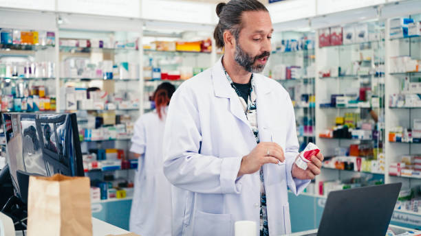 istock Male Pharmacist giving information via video call. 2160087466