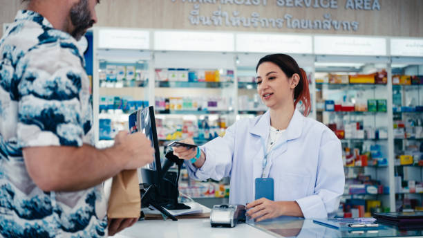istock Customer picks up the medicine at the pharmacy. 2160087497