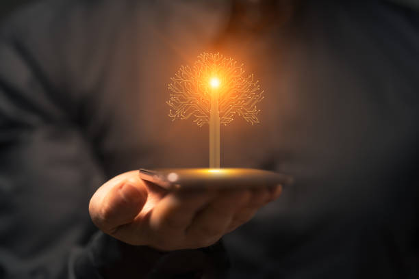 istock Artificial intelligence new life tree symbol on smartphone in hand 2160089867