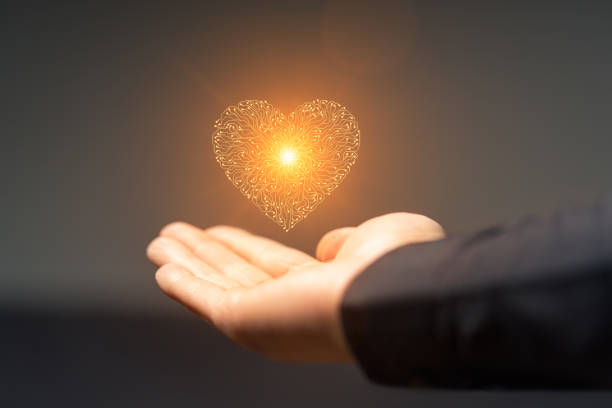 istock Artificial intelligence Circuit board heart symbol in mens hand 2160091474