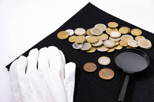 istock pile of Euro coins sits on a black felt surface 2160095423