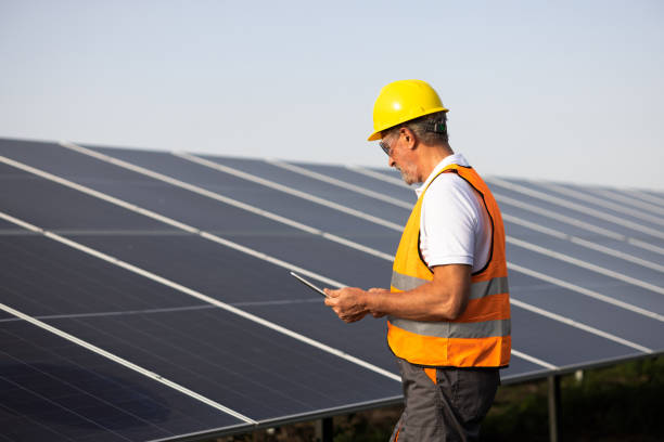 istock Senior technician examining the solar energy installation 2160096338
