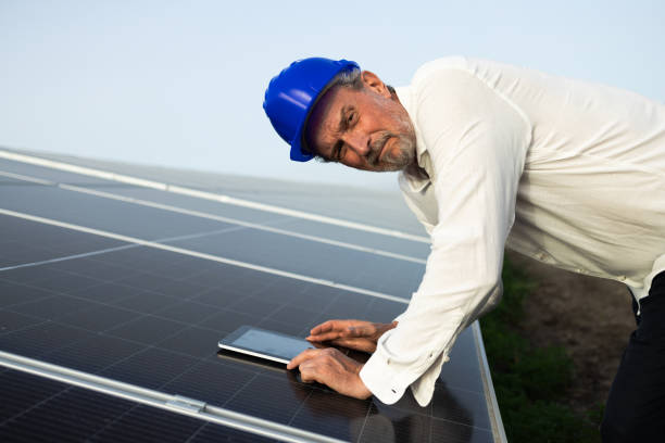 istock Mature engineer managing the maintenance of solar power systems 2160096423